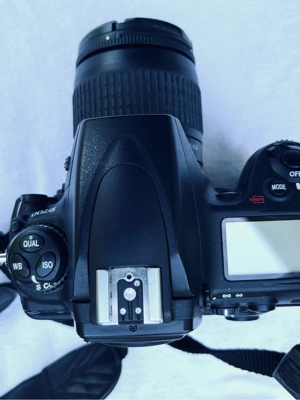 Nikon D700 with 50mm lens, battery grip.
